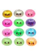 Colorful round toys with smiling faces on a white background