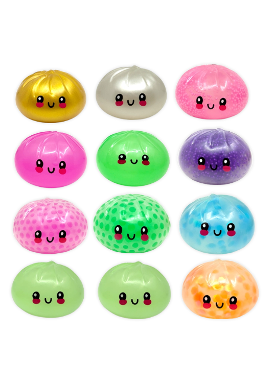 Colorful round toys with smiling faces on a white background