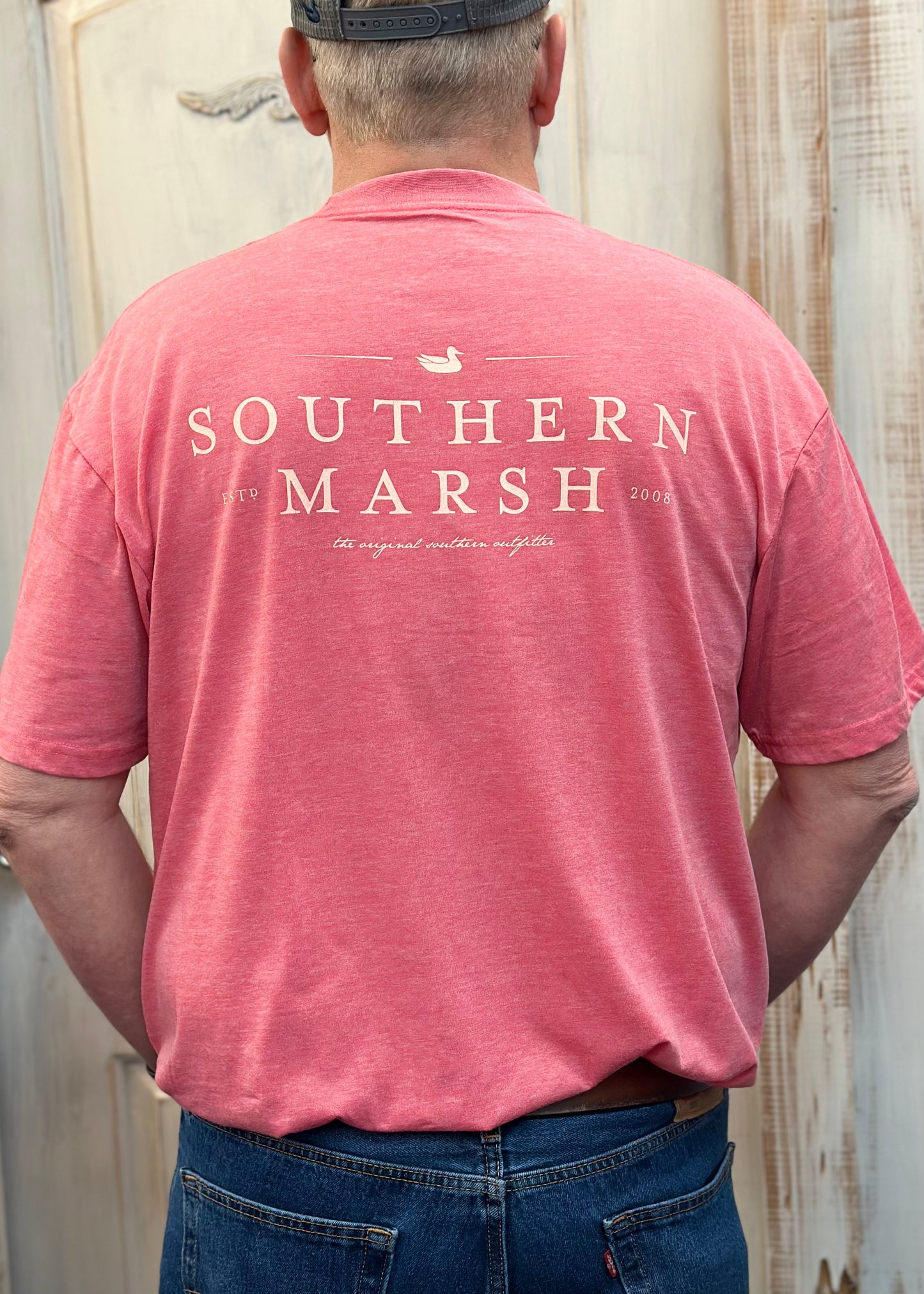 Jim wearing Southern Marsh Seawash Tee - Classic - Strawberry Fizz - Back View. Jimberly's Boutique Olive Branch MS